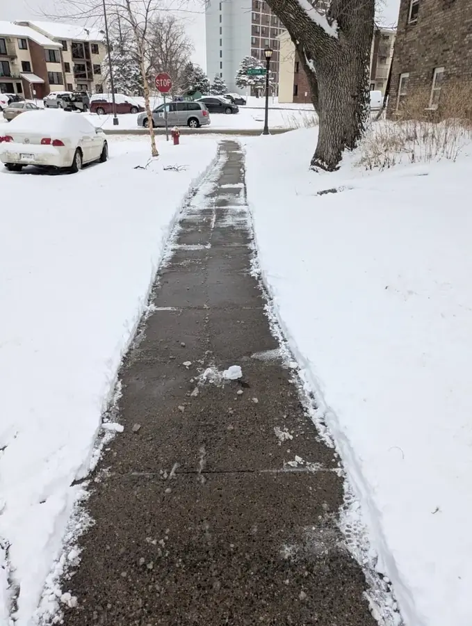 Sidewalk cleared down to the concrete
